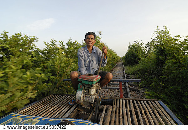 54 year old Khmer man 54 year old Khmer man, Cambodian, traveling along ...