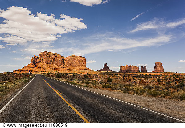 'A road leading to rugged rock formations in the desert; Arizona  United States of America'