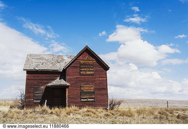 'An old  abandoned wooden farmhouse on the Alberta prairies; Orion  Alberta  Canada'