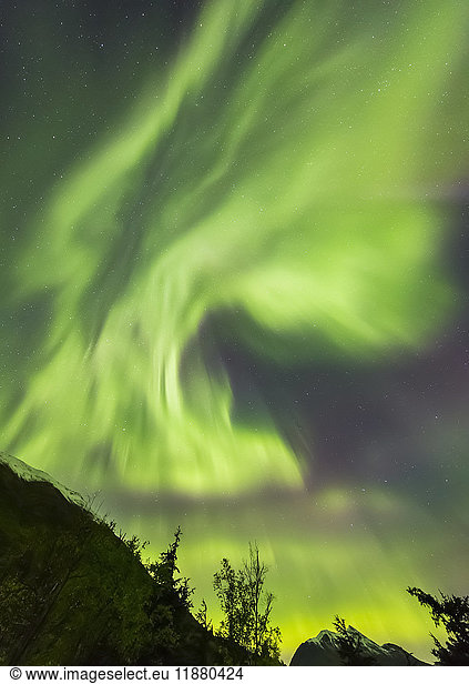 'Bright green aurora borealis dances over the Kenai Mountains  Moose Pass  Kenai Peninsula  South-central Alaska; Alaska  United States of America'