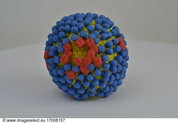 3D print of influenza virus. The virus surface (yellow) is covered with proteins called hemagglutinin (blue) and neuraminidase (red) that enable the virus to enter and infect human cells. For more information  visit the NIH 3D Print Exchange at http://3dprint.nih.govt. Credit: NIH. .