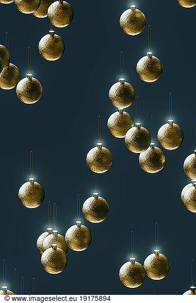 3D render of gold-colored Christmas ornaments