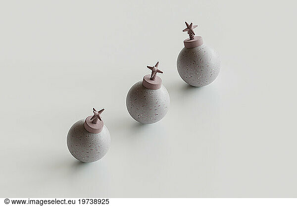 3d render of pink bombs on white background