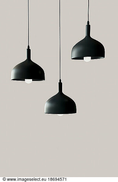 3D render of three black light fixtures hanging against pink background