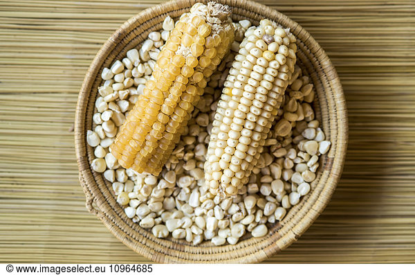 'Dried corn in a handwoven bowl; Maun  Botswana'