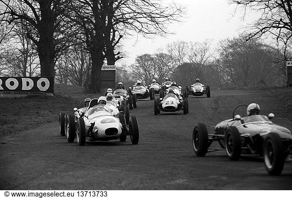 'Formula Junior cars entering Cascades in the Oulton Park Cup. No 1 Jim Clark´s Lotus 18  No 3 Mike McKee ´s Lotus 18  finished 3rd. No 23 Edward Hine´s Cooper T52. England 2 April 1960. '