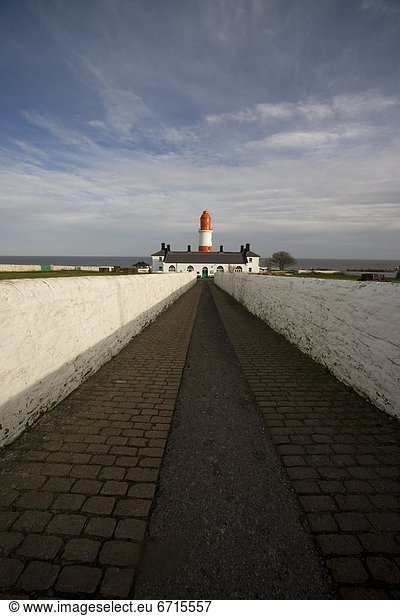 'Lighthouse At End Of Walkway