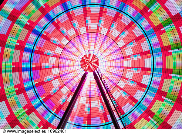 'Long exposure photograph showcasing the many color combinations the Big Wheel produces at night; Seattle  Washington  United States of America'