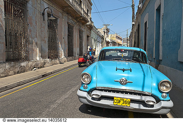 1955 Oldsmobile on Streets of Camaquey