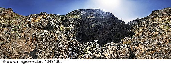 360Â° panorama with hiker  canyon of the Barranco de Guarimiar  La Gomera  Canary Islands  Spain  Europe