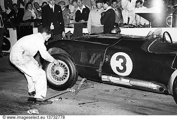 'Peter Whitehead-Ian Stewart´s Jaguar XK120C in the pits  finished 3rd in 9HRS race Goodwood  England 22 Aug 1953. '