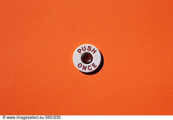 '''Push once'' button on orange background'