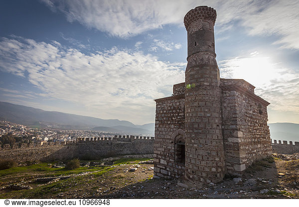 'Selcuk Castle and mosque with minaret; Ephesus Turkey'