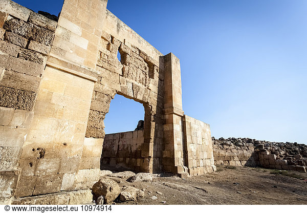 'Tell Haran  located in the fertile Haran Plain  which is watered by the Balikh River  a major tributary of the Euphrates River. Only the western gate  the Aleppo Gate  remains standing; Harran  Turkey'