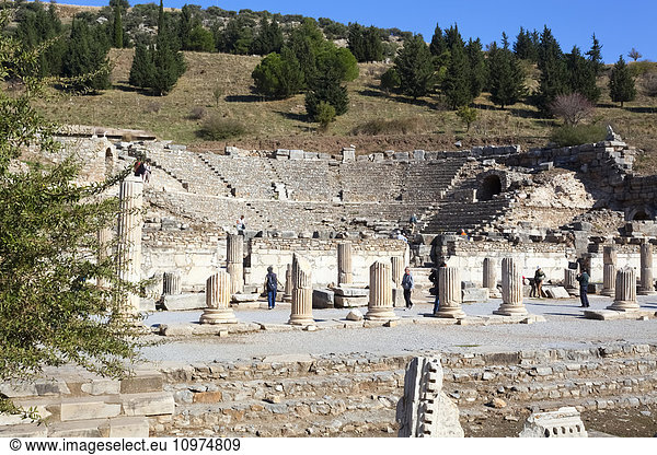 'Tourists at a theatre built in the second century; Ephesus Izmir Turkey'