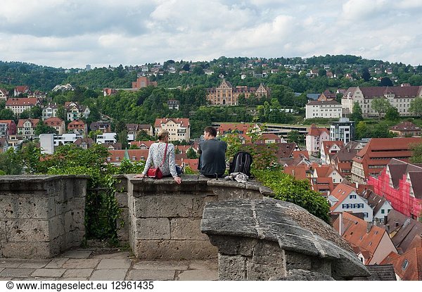 05. 06. 2017  Tuebingen  Baden-Wuerttemberg  Germany  Europe - A man and a woman enjoy the view from the Castle Hohentuebingen over Tuebingen's old town.