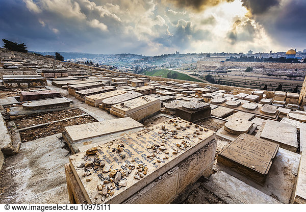 'Western slope of the Mount of Olives covered by thousands of Jewish graves facing toward the Temple Mount and the Eastern Gate of the old city of Jerusalem; Jerusalem,  Israel'