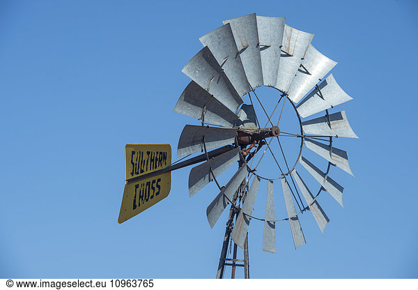 'Windmill against clear blue sky; Namibia'