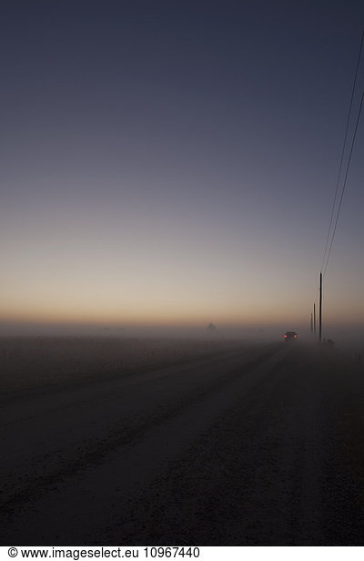 'Woolwich Guelph townline before sunrise on a foggy morning; Mosborough  Ontario  Canada'