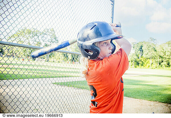 10 year old girl the batter on the little league team