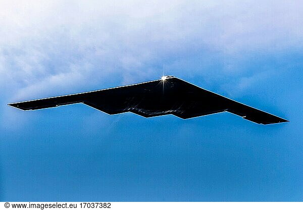 A B-2 Spirit stealth bomber flies over the U. S. Air Force Academy in Colorado Springs  Colo.   Nov. 16  2020. The B-2?.s stealth characteristics give it the unique ability to penetrate an enemy's most sophisticated defenses and threaten heavily defended targets.