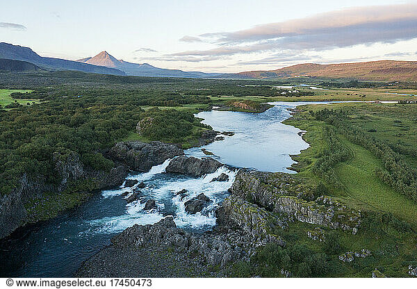 A beautiful waterfall in evening light in Iceland. Glanni waterfall.