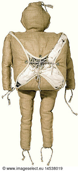 A British paradummy for D-Day  June 6th  1944.  While the American dummy had the nickname 'Oscar'  the British model was known as 'Rupert'. The dummy is made of sand-coloured  stuffed sackcloth/burlap with a parachute tied to its centre and loose ropes on the head and the lower part of the limbs. Size 80 cm. Very good condition  discovered in a storage building at an old British air field in the 1980s. In the early morning hours of June 6th  1944  the secret mission 'Titanic' started: RAF machines dropped paradummies over the French Atlantic coast to delude the German forces about the real landing points set up in the Normandy region. As far as known  members of historic  historical  1930s  20th century  20th century  object  objects  stills  clipping  clippings  cut out  cut-out  cut-outs