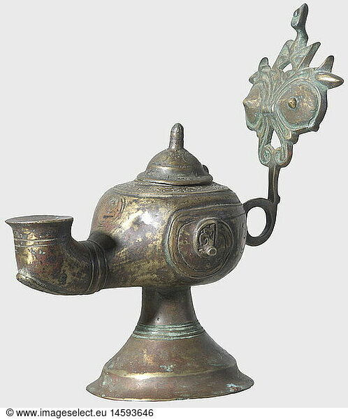 A bronze oil lamp  Central Asia  12th/13th century. Hollow cast body with engraved and crescent-shaped copper-inlaid decorations  hinged lid and long spout. Handle with ornamental relief and a stepped  flaring foot. Height 22 cm. historic  historical  13th century  12th century  Ottoman Empire  object  objects  stills  clipping  clippings  cut out  cut-out  cut-outs