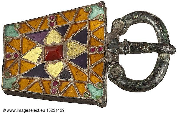 A buckle for a woman's dress  Visigothic Kingdom in Spain  6th century Large bronze buckle inset with pieces of glass of different colours arranged in geometrical patterns. Small central rectangular field with raised  roof-shaped cabochon made of a vermilion semi-precious stone  flanked on all four sides by heart-shaped inlays with gold foil underlay  surrounded by two rows of triangular  mostly orange-coloured and a few purple glass inlays  interrupted by small circular inlays in red. The corners with flower-shaped inlays of greenish glass. Oval frame and prong with shield-shaped base. During restoration the original inlays  which had worked loose because the putty had started to crumble  were thorou ancient world