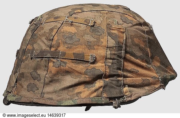 A camouflage cover for a steel helmet  reversible outer covering for the Waffen-SS Helmet cover for Waffen-SS units. Model in brown-green oak leaf camouflage pattern for spring  reversible to oak leaf camouflage pattern in autumn colours. Both sides printed in plane-tree camouflage material  twelve separate attachment loops. Three magnetic fastening hooks to be fastened to the helmet. The inside of the autumn pattern with number designation '5659'. A rare equipment configuration. See Beaver  M  Camouflage Uniforms of the Waffen-SS  pp. 127 - 136  historic  historical  1930s  20th century  Waffen-SS  armed division of the SS  armed service  armed services  NS  National Socialism  Nazism  Third Reich  German Reich  Germany  military  militaria  utensil  piece of equipment  utensils  object  objects  stills  clipping  clippings  cut out  cut-out  cut-outs  fascism  fascistic  National Socialist  Nazi  Nazi period  uniform  uniforms  headpiece  headpieces  helmet  helmets  camouflage  camouflages