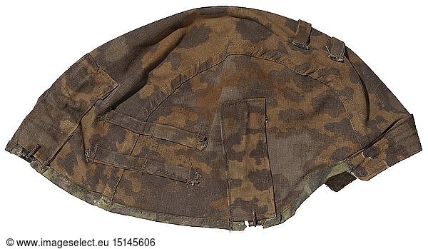 A camouflage cover for a steel helmet Reversible outer covering for the Waffen-SS units. Model in brown-green oak leaf camouflage pattern for spring  reversible to oak leaf camouflage pattern in autumn colours. Both sides printed in plane tree camouflage material  twelve separate attachment loops. Three magnetic fastening hooks for fixation on the helmet. A rare piece of equipment. Cf. Beaver  M  Camouflage Uniforms of the Waffen-SS  pp. 127 - 136. historic  historical  20th century  1930s  1940s  Waffen-SS  armed division of the SS  armed service  armed services  NS  National Socialism  Nazism  Third Reich  German Reich  Germany  military  militaria  utensil  piece of equipment  utensils  object  objects  stills  clipping  clippings  cut out  cut-out  cut-outs  fascism  fascistic  National Socialist  Nazi  Nazi period