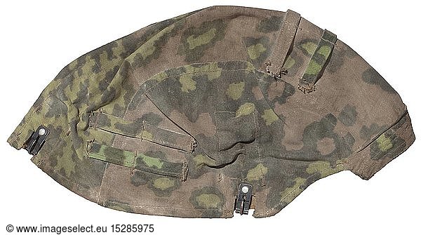 A camouflage cover for a steel helmet Reversible outer covering for the Waffen-SS units. Model in brown-green oak leaf camouflage pattern for spring  reversible to oak leaf camouflage pattern in autumn colours. Both sides printed in plane tree camouflage material  twelve separate attachment loops. Three magnetic fastening hooks for fixation on the helmet. A rare piece of equipment. Cf. Beaver  M  Camouflage Uniforms of the Waffen-SS  pp. 127 - 136. historic  historical  20th century  1930s  1940s  Waffen-SS  armed division of the SS  armed service  armed services  NS  National Socialism  Nazism  Third Reich  German Reich  Germany  military  militaria  utensil  piece of equipment  utensils  object  objects  stills  clipping  clippings  cut out  cut-out  cut-outs  fascism  fascistic  National Socialist  Nazi  Nazi period
