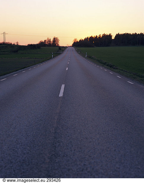 A country road in the sunset Sweden.