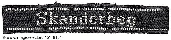 A cuff-title 'Skanderbeg' for enlisted men/NCOs of the 21st Freiwilligen-Panzer-Grenadier-Division of the SS (Albanian no. 1). Black and silver-grey woven BeVo-like version with unsewn ends. Unissued. Length 45 cm. historic  historical  20th century  1930s  1940s  Waffen-SS  armed division of the SS  armed service  armed services  NS  National Socialism  Nazism  Third Reich  German Reich  Germany  military  militaria  utensil  piece of equipment  utensils  object  objects  stills  clipping  clippings  cut out  cut-out  cut-outs  fascism  fascistic  National Socialist  Nazi  Nazi period