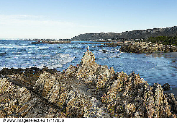 A deserted beach  jagged rocks and rockpools on the Atlantic coast.