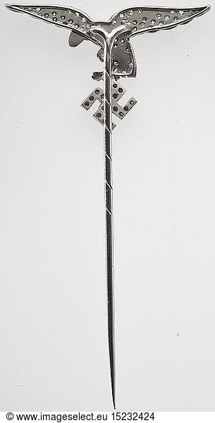 A diamond-studded presentation needle made from platinum and white gold  in the form of the Luftwaffe eagle The eagle made from platinum  the more than 60 diamond roses with Ã Â  jour setting made from white gold  the needle also made from white gold. Total height 62 mm  wing span 32 mm  weight 4.29 g. High-quality work  presumably a present of honour from Hermann GÃ¶ring. historic  historical  Air Force  branch of service  branches of service  armed service  armed services  military  militaria  air forces  object  objects  stills  clipping  clippings  cut out  cut-out  cut-outs  20th century