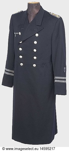 A dress uniform coat for a senior administrative official.  Private purchase piece of fine  navy blue cloth with silver anchor buttons  sleeve bars (First Lieutenant)  embroidered party eagle  and branch insignia. Sewn shoulder boards for a naval lieutenant with cornflower blue backing. Black silk lining. historic  historical  1930s  1930s  20th century  navy  naval forces  military  militaria  branch of service  branches of service  armed forces  armed service  object  objects  stills  clipping  clippings  cut out  cut-out  cut-outs