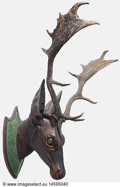 A fallow deer trophy  German  circa 1800 The antler trophy of a fallow deer on a lavishly carved  coloured deer head. Shield-shaped base plate. Height circa 72 cm. historic  historical  19th century  hunt  hunts  hunting  utensil  piece of equipment  utensils  trophies  object  objects  stills  clipping  clippings  cut out  cut-out  cut-outs