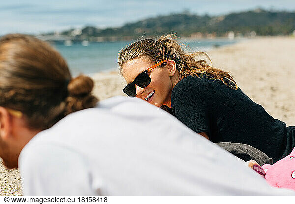 A family having fun on a sunny beach in Anaheim California  USA