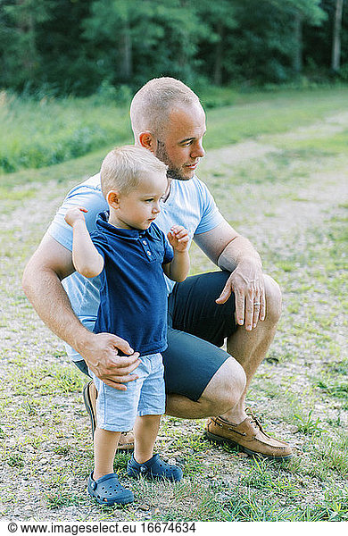 A father and son moment outdoors in nature
