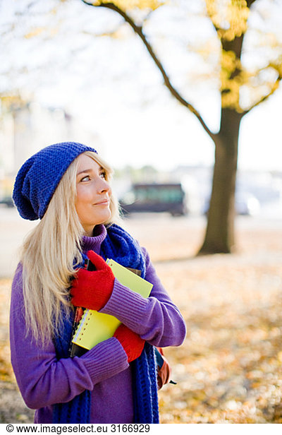 A female student in autumn Sweden.