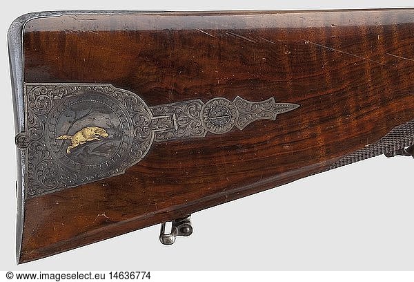 A fine German percussion rifle  Tanner & Sohn  Hanover  circa 1855. Fine octagonal Damascus barrel with patent breech block and seven-groove rifled bore in 13 mm calibre. Dovetailed iron front sight and adjustable rear sight. Above the chamber gold band inlays and signature 'C.D. Tanner & Sohn in Hannover'. Foliage engraved nipple socket and tang. Back-action percussion lock with rotating cock buffer and double set trigger  the lock plate finely engraved with gold-inlaid wild boar hunting scene. Beautiful walnut half stock with en suite-engraved iron furniture  a gold-inlaid lion on the blued trigger guard. Engraved patch box lid displaying a dog inlaid in gold. Rear trigger guard made of open-worked horn. Original iron ramrod. Exquisitely made rifle in very good condition. Length 121 cm. Carl Daniel Tanner & Sohn  Hannover  mentioned 1854 - 58  historic  historical  19th century  civil long guns  gun  weapons  arms  weapon  arm  firearm  fire arm  gun  fire arms  firearms  guns  object  objects  stills  clipping  clippings  cut out  cut-out  cut-outs