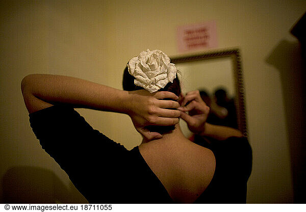 A Flamenco dancer  or bailaora  gets ready backstage in Ubrique  Cadiz province  Andalusia  Spain.