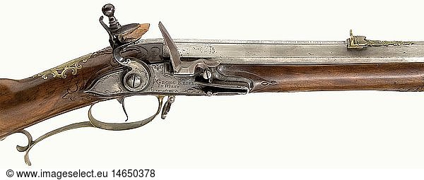 A flintlock rifle  Georg Keiser in Vienna  circa 1730. Heavy octagonal barrel with a slightly reduced diameter in the middle. Seven groove rifled bore in 17 mm calibre. Engraved dovetailed folding sights. Silver inlaid decorative scrolls on the breech and the base of the barrel with the signature 'Georg Keiser in Wienn'. Tang engraved with the number '1'. The lock bears finely engraved rocaille decoration. The action block cover is a replacement. Gold bushed vent. Beautifully figured  lightly carved walnut full stock. Small repair on the forearm. Patchbox. Finely engraved brass furniture. The side plate shows a mounted hunter with a hound chasing a stag. Wooden ramrod with horn tip. Length 112 cm. Georg Keiser (1647 - 1740) was a master in Vienna from 1671. He was known to have made guns even in advanced old age. Cf. StÃ¶ckel p. 615. historic  historical  18th century  civil long guns  gun  weapons  arms  weapon  arm  firearm  fire arm  gun  fire arms  firearms  guns  object  objects  stills  clipping  clippings  cut out  cut-out  cut-outs