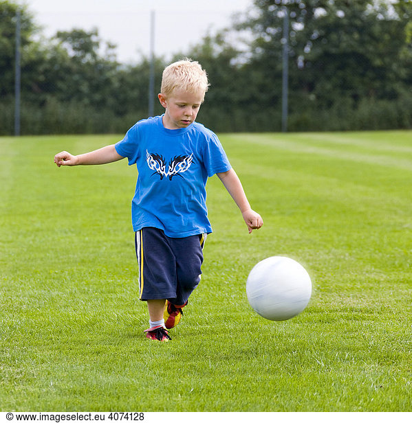 A four-year-old boy at soccer practice
