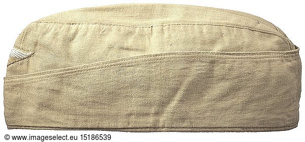 A garrison cap for NCOs/enlisted men in tropical issue Depot piece in sand-coloured linen  light brown inner liner with stamping 'Berolina Berlin 1942'  the size stamped '56'  BeVo weave insignia on a sand-coloured ground. historic  historical  Air Force  branch of service  branches of service  armed service  armed services  military  militaria  air forces  object  objects  stills  clipping  clippings  cut out  cut-out  cut-outs  20th century