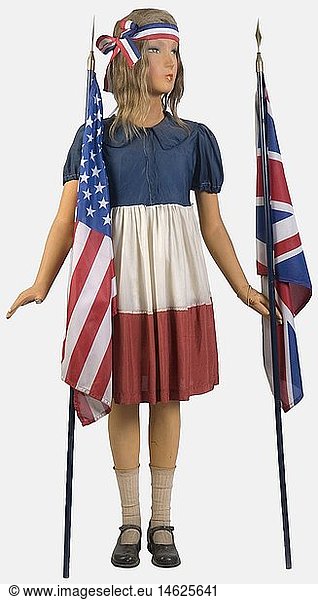 A girl celebrating the Liberation  on mannequin  with a tricolor headband. She wears a dress made of blue  white and red rayon  a white cloth underskirt  cotton knickers  long cotton socks and light sandals made of black glossy leather. The mannequin holds the British flag in one hand and the American one in the other. Living reconstruction from the summer of 1944. historic  historical  people  1930s  20th century  object  objects  stills  clipping  clippings  cut out  cut-out  cut-outs  flag  flags  insignia  symbol  symbols  emblem  emblems
