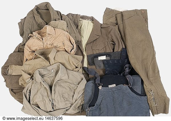 A group of US Army/Navy garments  including an EM greatcoat of dark green wool with buttons  a HBT jacket  a pair of motorcyclist's trousers of green cloth  an EM shirt  a fatigue jacket without pockets  general issue trousers  a shirt (bad condition)  a walking-out 'IKE' jacket  US Navy EM trousers  a blue US Navy dungarees. historic  historical  20th century  USA  United States of America  American  object  objects  stills  clipping  clippings  cut out  cut-out  cut-outs  utensil  piece of equipment  utensils  kit  kits  military  militaria  uniform  uniforms  clothes  textile  outfit  outfits  wearings