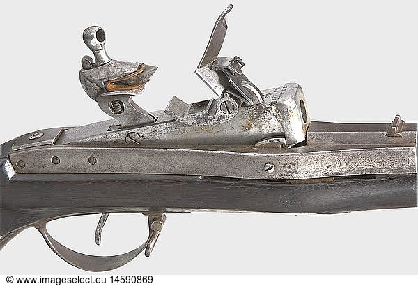 A Harper's Ferry model 1819 Hall Rifle  type II  made in 1831. Round  32 5/8 inch barrel in cal..52 with dovetailed sights. Inscribed  'J.H. HALL - H. FERRY - U.S. 1831' on the frame. Breech-loading system with a tipping chamber block and flintlock ignition. Blackened walnut stock (small repair behind the frame  stamped 'T' behind the trigger guard. Iron furniture and ramrod. Metal surfaces are stained or slightly pitted in places. Length 134 cm. Rare  early infantry weapon. Of the barely 20 000 pieces made  a large number were converted to percussion ignition during the Civil War. historic  historical  20th century  USA  United States of America  American  object  objects  stills  clipping  clippings  cut out  cut-out  cut-outs  firearm  fire arm  gun  fire arms  firearms  guns  handgun  weapon  arms  weapons  arms