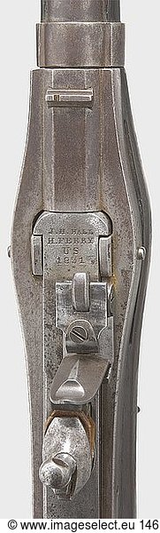A Harper's Ferry model 1819 Hall Rifle  type II  made in 1831. Round  32 5/8 inch barrel in cal..52 with dovetailed sights. Inscribed  'J.H. HALL - H. FERRY - U.S. 1831' on the frame. Breech-loading system with a tipping chamber block and flintlock ignition. Blackened walnut stock (small repair behind the frame  stamped 'T' behind the trigger guard. Iron furniture and ramrod. Metal surfaces are stained or slightly pitted in places. Length 134 cm. Rare  early infantry weapon. Of the barely 20 000 pieces made  a large number were converted to percussion ignition during the Civil War. historic  historical  20th century  USA  United States of America  American  object  objects  stills  clipping  clippings  cut out  cut-out  cut-outs  firearm  fire arm  gun  fire arms  firearms  guns  handgun  weapon  arms  weapons  arms